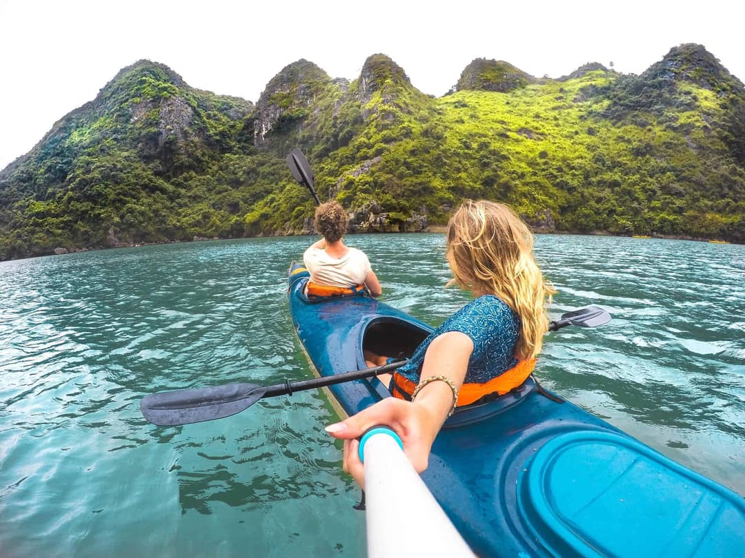 cat ba halong bay vietnam kayak couple