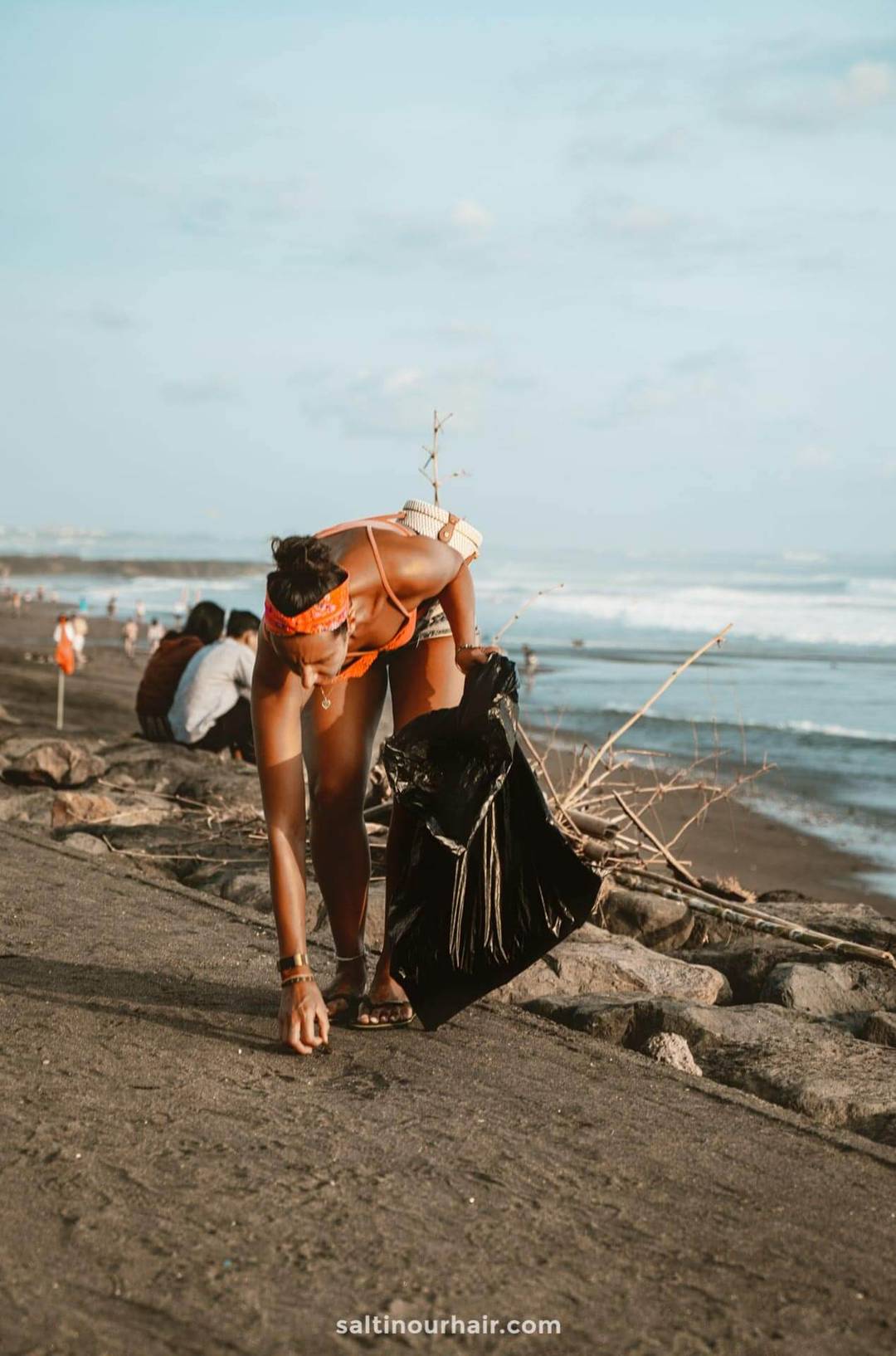 sustainable travel beach cleanup