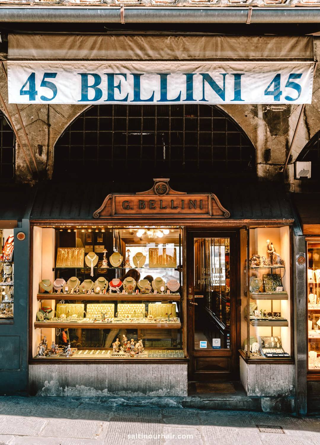 Jewelry store named G. Bellini with a display of gold jewelry in the window, under a banner reading &ldquo;45 BELLINI 45&rdquo;&mdash;a must-see stop on any Italy 7 day itinerary.