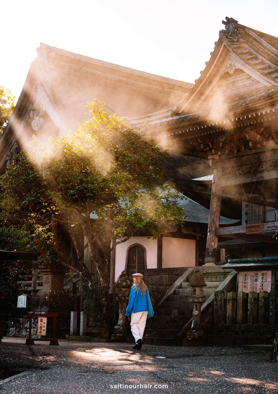 Japan 3-week itinerary Seiganto-ji Temple girl walking in morning sun light
